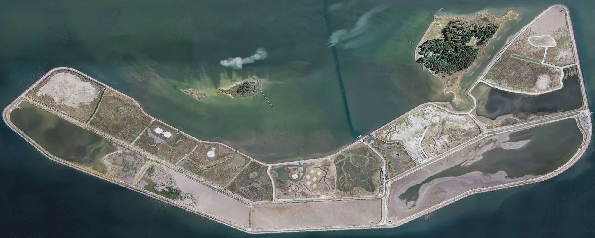 An aerial view of restored island habitat and dredged material placement areas